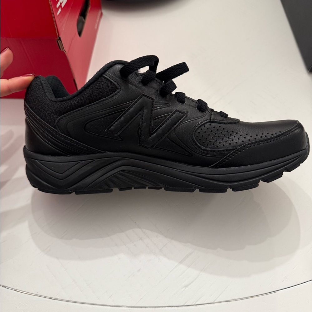 New Balance All-Black Sneakers